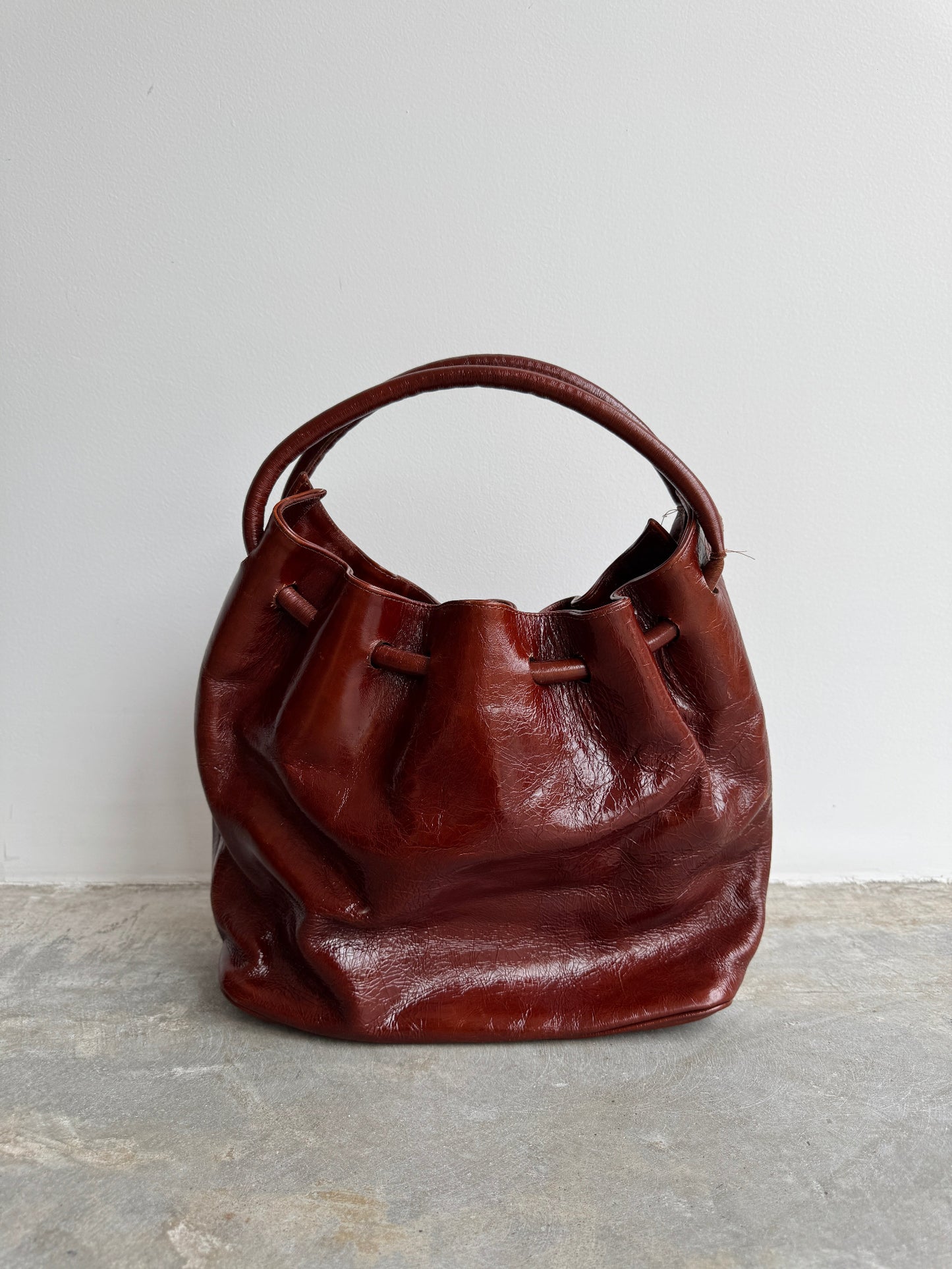 BOLSA COURO CONHAQUE
