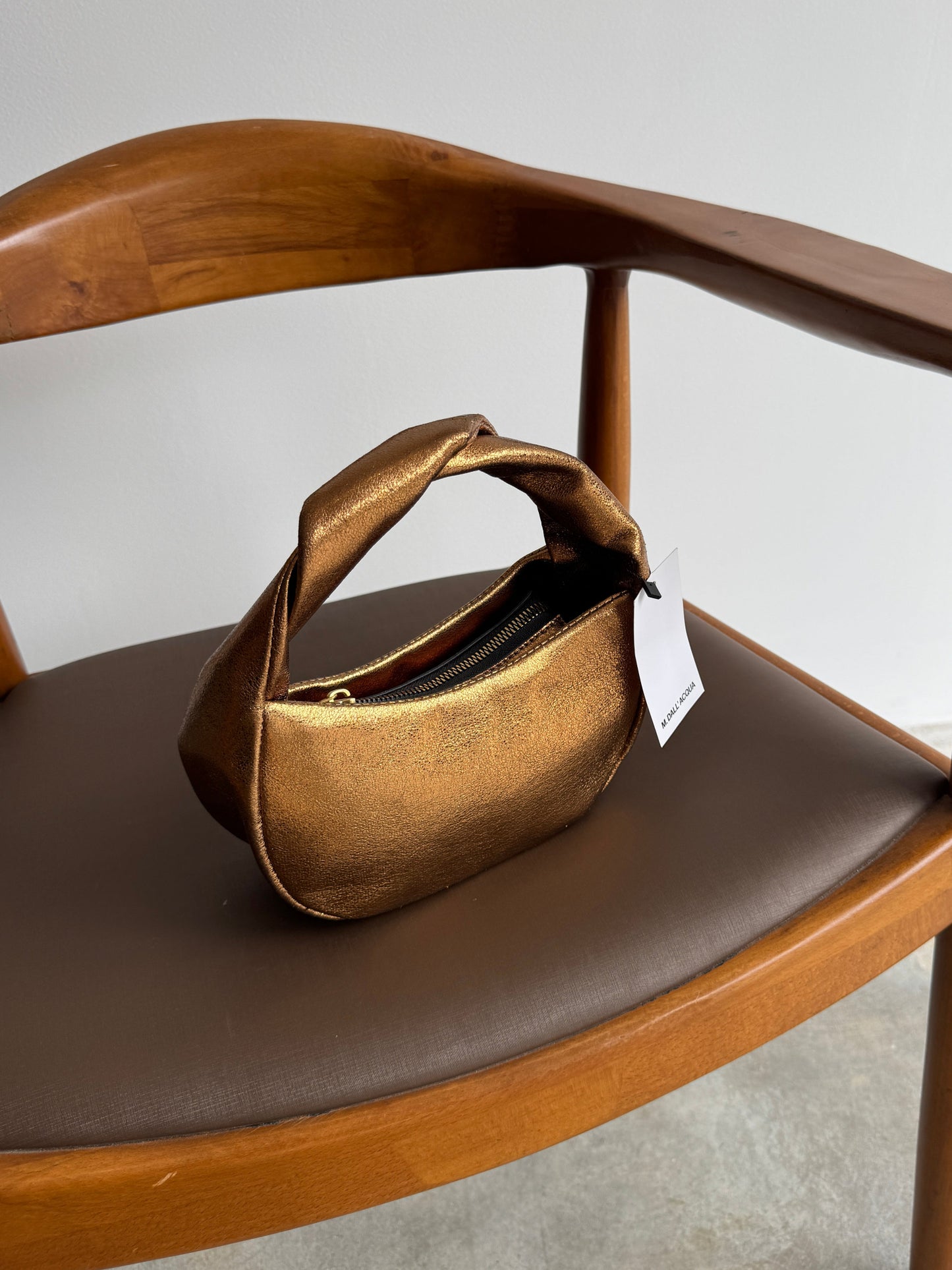 BOLSA DE MÃO BRONZE - U